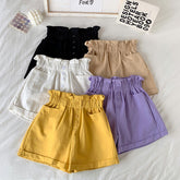 Shorts mit elastischer Taille und Tasche und Knopf