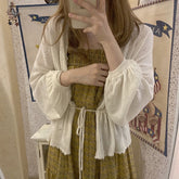 Tops exteriores de gasa con encaje fino y suelto