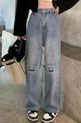 Pantalones vaqueros largos de cintura alta con cara de monstruo sonriente