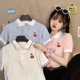 Lockeres Poloshirt mit Kirsch-Taschenstickerei