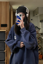 Lässiger Pullover mit Herztaschen und Logokragen