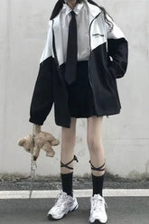 Schwarz-Weiß-Farbkombination Reißverschluss Kapuzenjacke