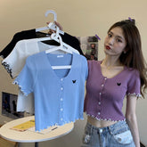 Camisas ajustadas con bordado de mariposas