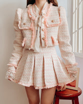 Conjunto de tweed con borlas