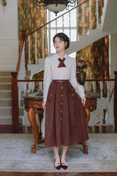 Midirock aus Wildleder mit Knöpfen