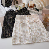 Minirock aus Tweed mit Knöpfen