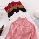 Suéter de cuello alto acanalado