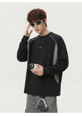 Sudadera con cuello redondo y rayas de patchwork