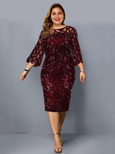 Kleid mit Paillettenverzierung und Viertelärmeln