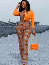 Mono a cuadros con cuello vuelto