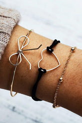 Pulsera de capas con lazo de corazón