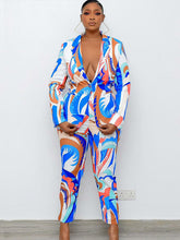 Traje de dos piezas con estampado brillante y liso