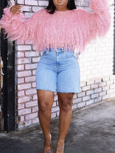 Strickpullover mit Paillettenquaste