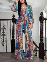 Monos de pierna ancha con cuello en V y estampado de serpiente