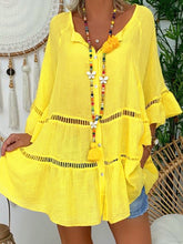 Vestido holgado con escote en V y aberturas