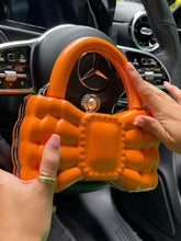 Mini bolso con forma de lazo