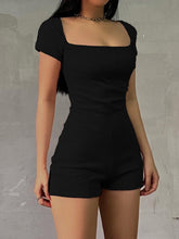 Mono de canalé negro de manga corta