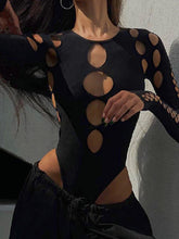 Body negro de manga larga con aberturas