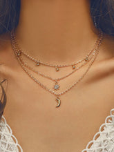 Collar con decoración de luna y estrella de diamantes de imitación de varias capas