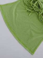 Top bandeau verde con lazo en la espalda