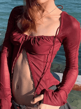 Top de corsé de manga larga de malla