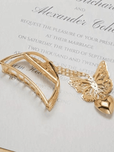 Garra para el cabello con decoración de cadena de mariposa