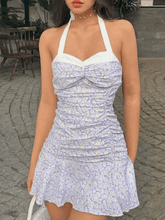 Vestido floral con cuello halter y colores en contraste