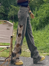 Vaqueros rasgados de talle alto con bordado y corte holgado