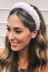 Diadema acolchada Matador de terciopelo perlado.