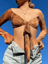 Blusa de malla con hombros descubiertos y cordones