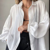 Camisa texturizada con mangas de obispo - Blanca