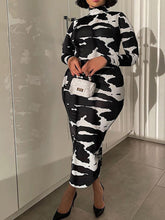 Vestido tubo de cuello alto con estampado