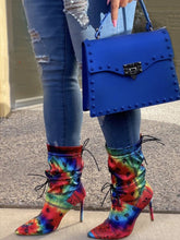 Bolso con decoración de remaches de gelatina