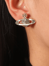 Pendiente con diseño de planeta con diamantes de imitación