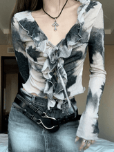 Blusa corta de manga larga con cordones y ribete de volantes