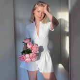 Mono deportivo con volantes en la pierna, manga corta, cuello alto y cremallera - Blanco