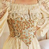 Süßes, gerüschtes, seitlich geschnürtes, kurzes Korsett-Top mit Haken- und Ösenmuster und Blumenmuster - Grün