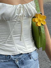 Top de corsé de satén con lazo delantero