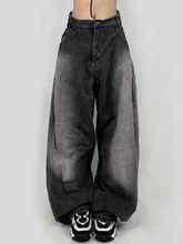 Vaqueros boyfriend con cintura lavada en contraste, plisados y pierna relajada