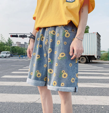 Pantalones cortos vaqueros con estampado de girasoles