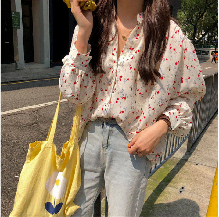 Camisa elegante con estampado floral y cuello en V 