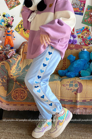 Pantalones deportivos kawaii con estampado de corazones 