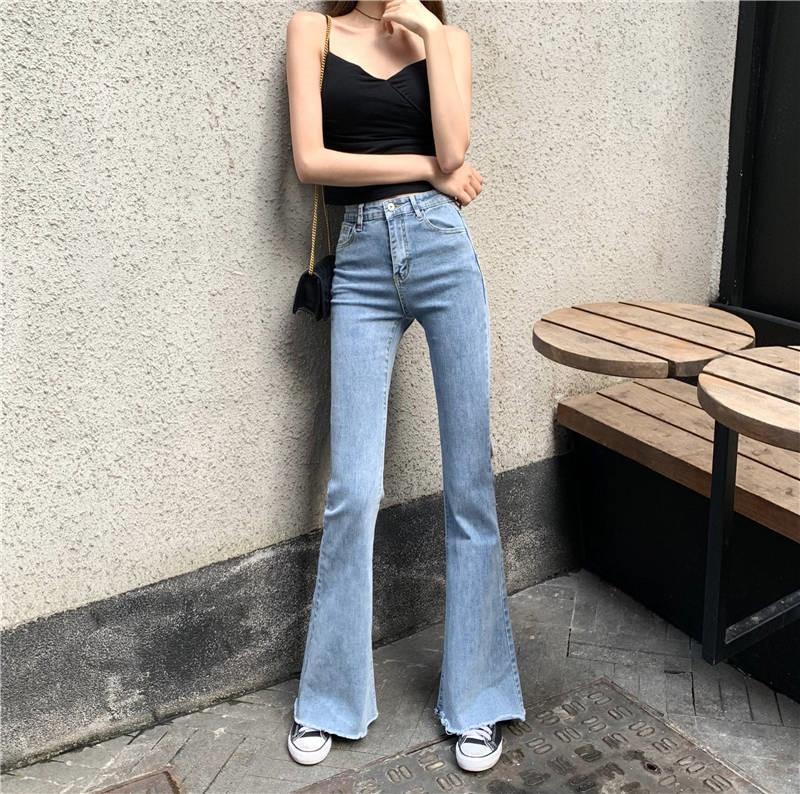 Skinny-Jeans mit weitem Bein und hoher Taille 