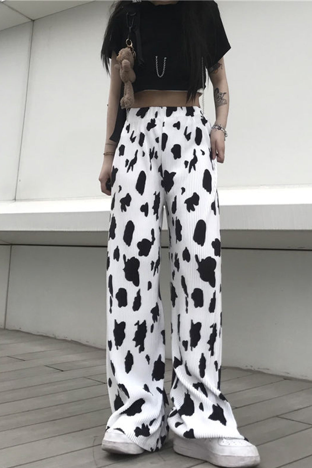 Pantalones largos de cintura alta con estampado de vaca lechera 