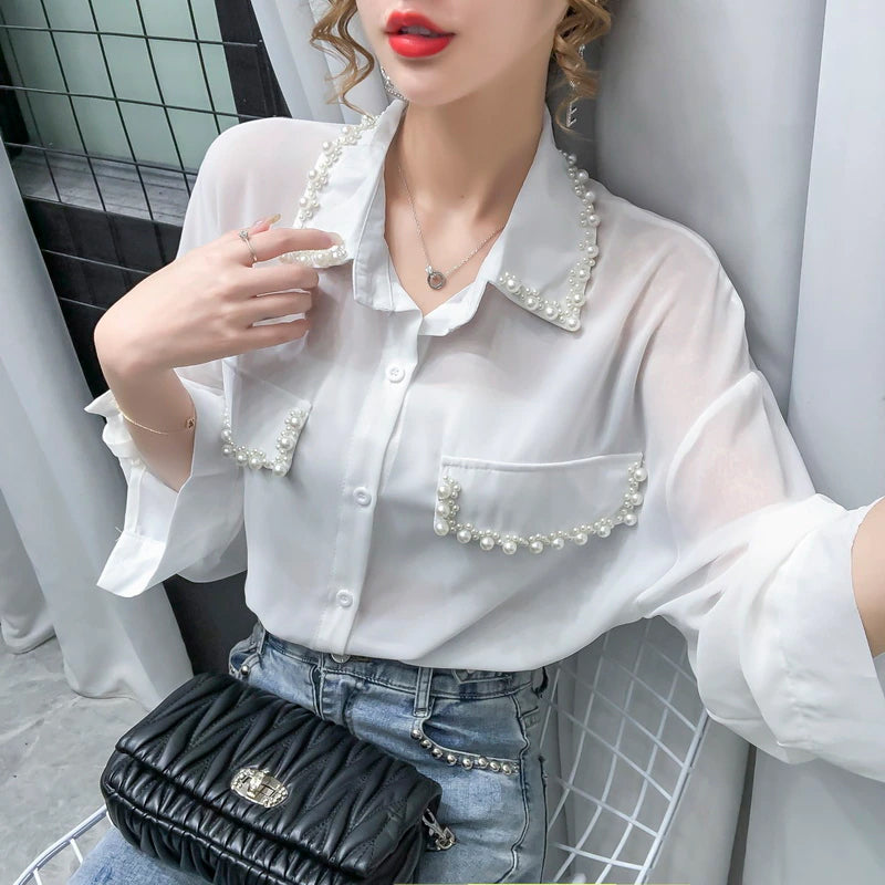 Blusa de gasa con cuentas y mangas largas 
