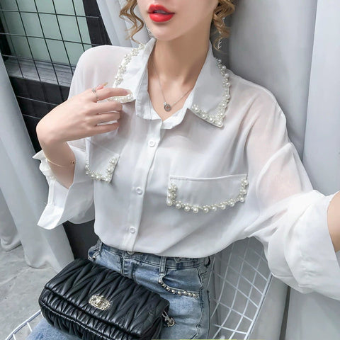 Blusa de gasa con cuentas y mangas largas 