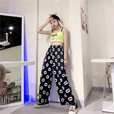 Pantalones sueltos con estampado floral de margaritas kawaii