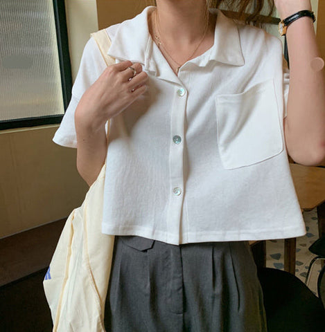 Camisa corta, sencilla y dulce con bolsillos 