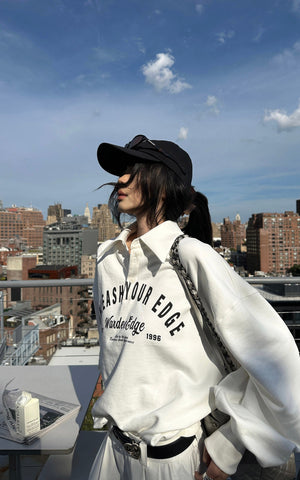 Oversized Polo Sweatshirt with Bold Graphic Print and Streetwear Edge