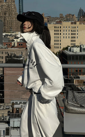Oversized Polo Sweatshirt with Bold Graphic Print and Streetwear Edge